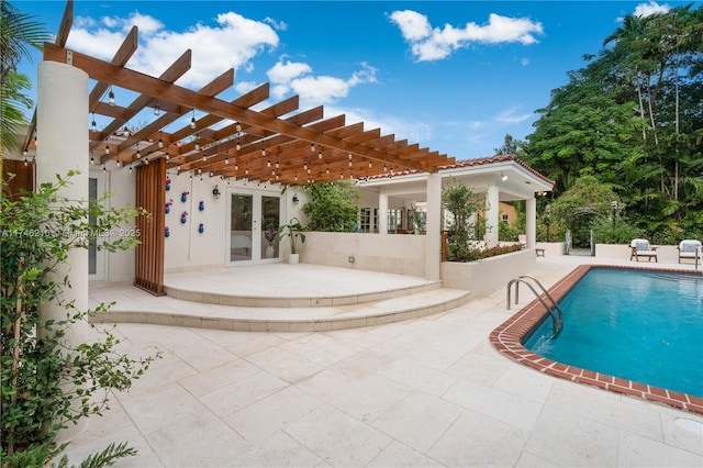 outdoor pool featuring french doors, a patio, and a pergola