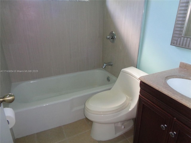 bathroom with vanity, toilet, and tile patterned floors