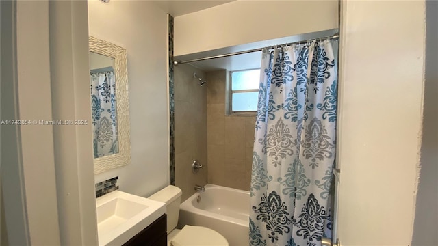 full bathroom with vanity, toilet, and shower / bath combo with shower curtain