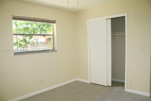 unfurnished bedroom featuring a closet