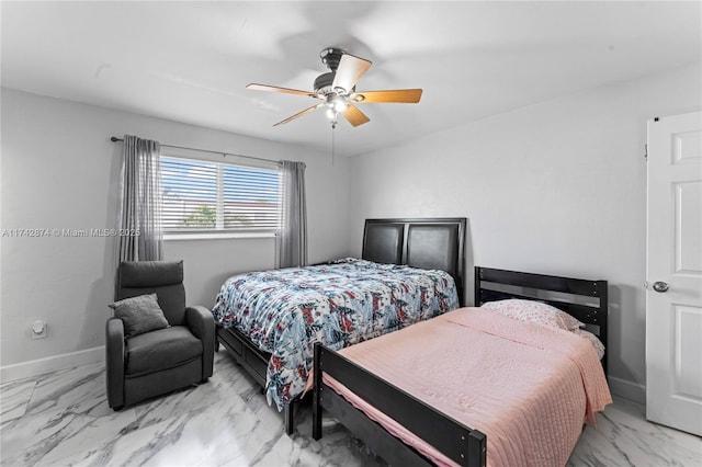 7140 W 2nd Way Unit 7140, Hialeah, FL 33014 - bedroom with light marble finish flooring, baseboards, and ceiling fan