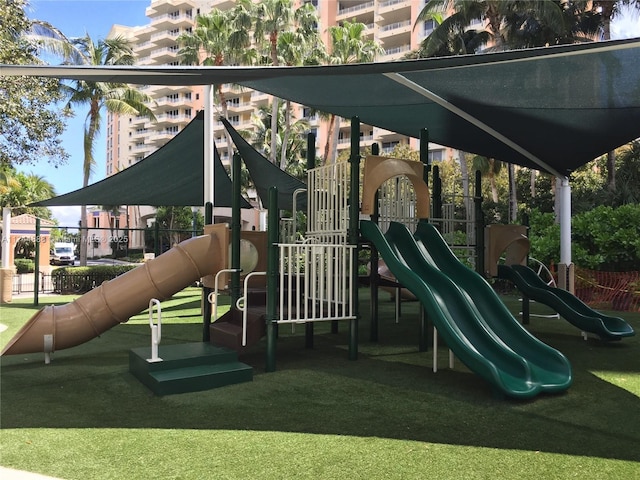 view of play area with a yard