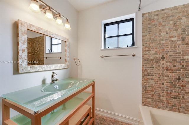 bathroom featuring vanity and separate shower and tub