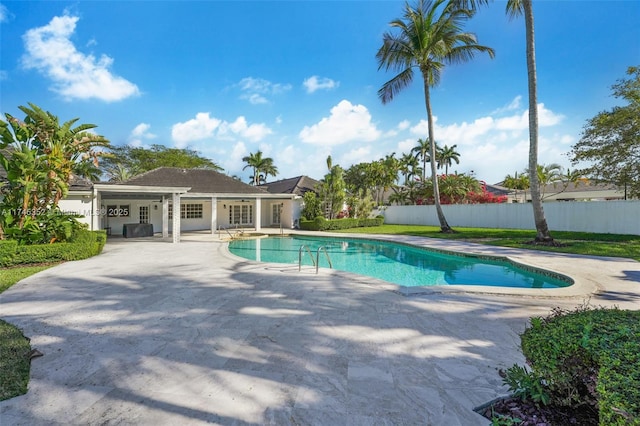 view of pool featuring a patio area