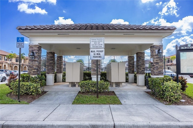 view of home's community featuring mail boxes