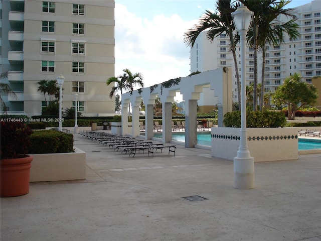 770 Claughton Island Dr Unit 1708, Miami, FL 33131 - view of property's community featuring a swimming pool and a patio