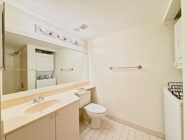 bathroom with vanity, tile patterned floors, and toilet