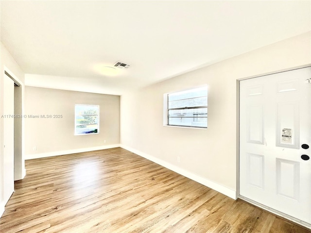 interior space with light hardwood / wood-style flooring