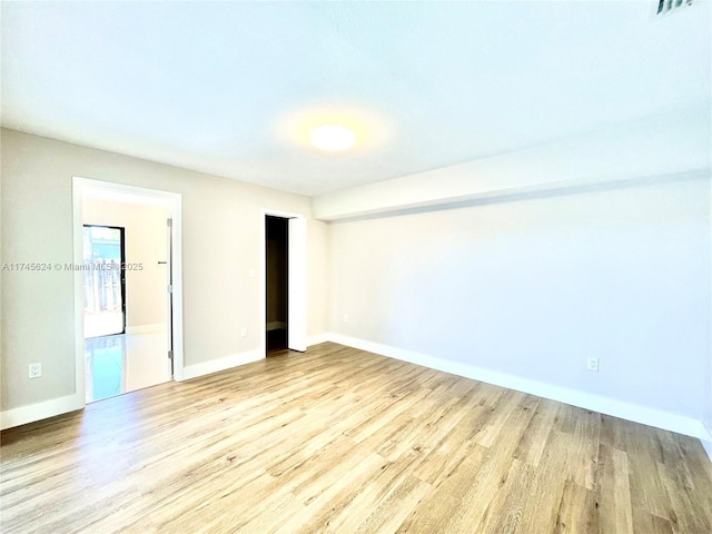 empty room featuring light wood-type flooring