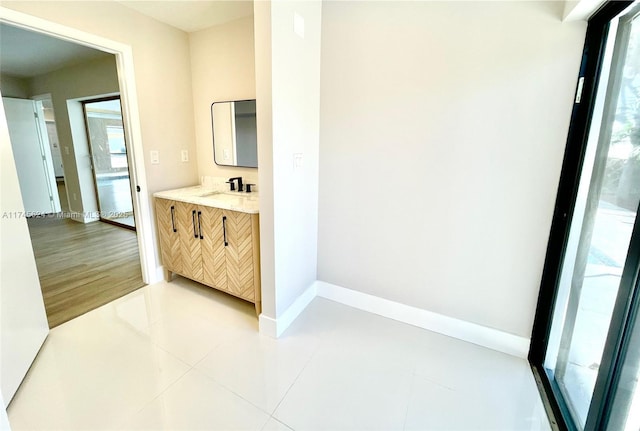 bathroom with vanity and tile patterned floors