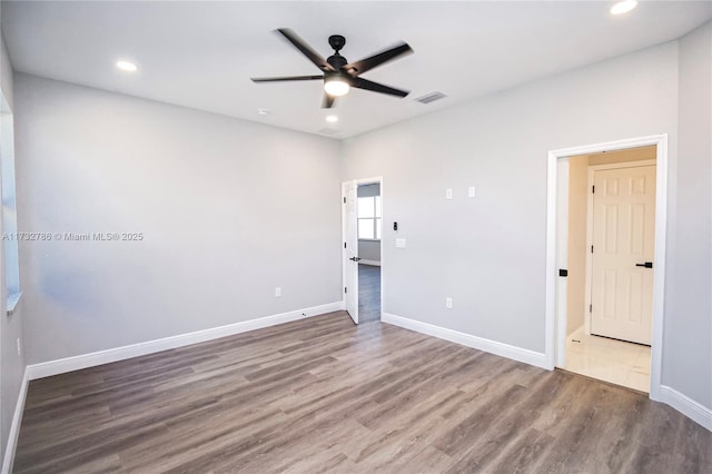 unfurnished bedroom with hardwood / wood-style flooring and ceiling fan