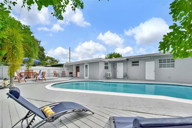 view of swimming pool with a fenced in pool, a patio area, and fence