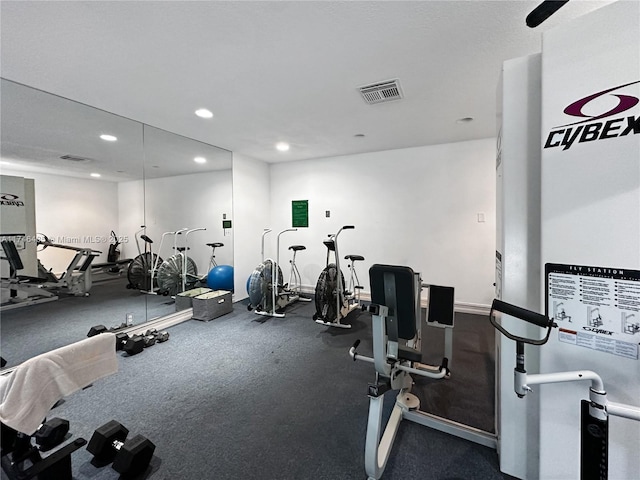 exercise room with recessed lighting and visible vents