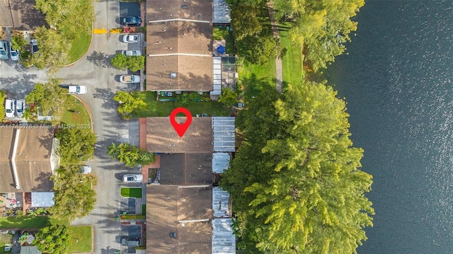 drone / aerial view with a water view