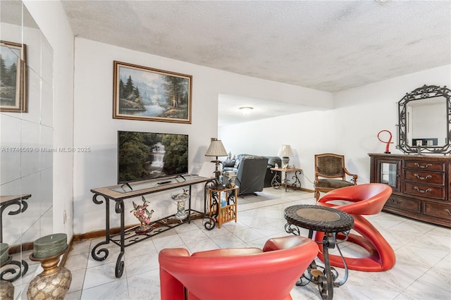 living room with a textured ceiling