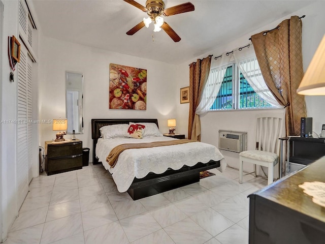 bedroom featuring a wall mounted air conditioner, a closet, and ceiling fan