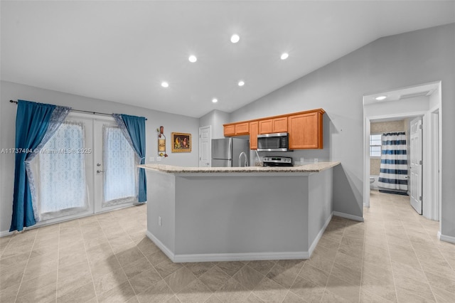 kitchen with baseboards, lofted ceiling, light stone countertops, stainless steel appliances, and french doors