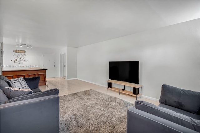 living room with light tile patterned floors