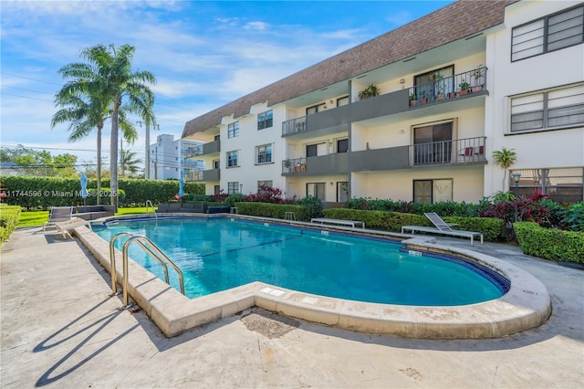 view of pool featuring a patio area