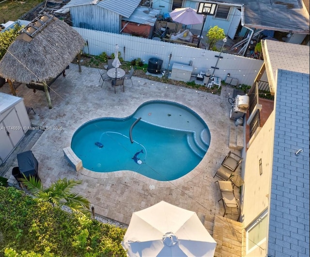 766 E 48th St, Hialeah, FL 33013 - view of swimming pool with a patio, a fenced in pool, and a fenced backyard