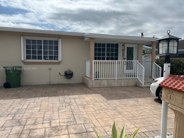 766 E 48th St, Hialeah, FL 33013 - exterior space featuring a patio area and stucco siding