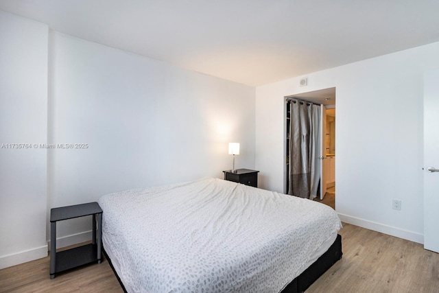 345 Ocean Dr Unit 819, Miami Beach, FL 33139 - bedroom featuring light wood-type flooring