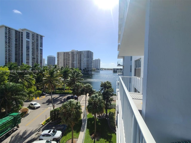 balcony featuring a water view