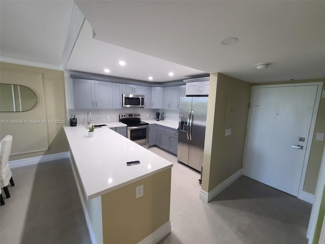 2851 NE 183rd St Unit 511E, Aventura, FL 33160 - kitchen with backsplash, stainless steel appliances, sink, and gray cabinetry