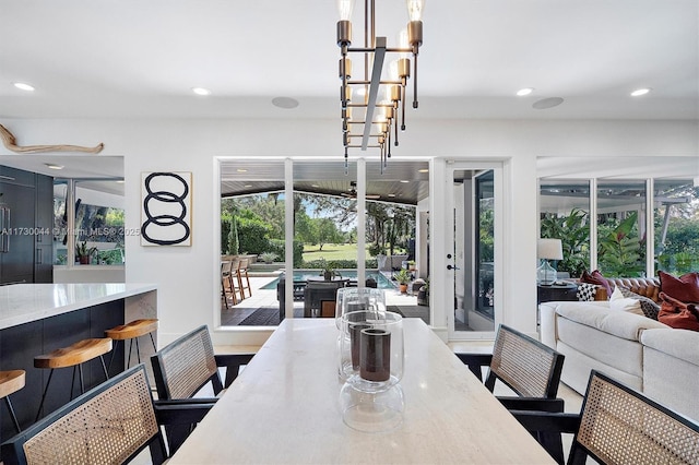 dining space with recessed lighting