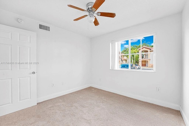 3505 Briar Bay Blvd Unit 104, West Palm Beach, FL 33411 - carpeted spare room with ceiling fan, baseboards, and a smoke detector