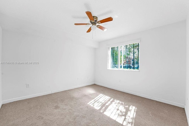3505 Briar Bay Blvd Unit 104, West Palm Beach, FL 33411 - carpeted spare room with ceiling fan and baseboards
