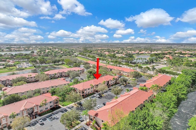 3505 Briar Bay Blvd Unit 104, West Palm Beach, FL 33411 - aerial perspective of suburban area featuring a large body of water