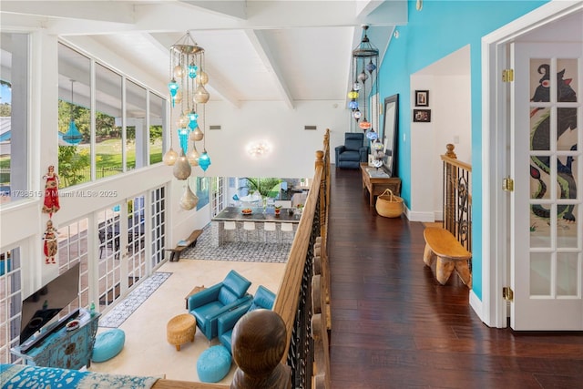 interior space featuring beamed ceiling and french doors