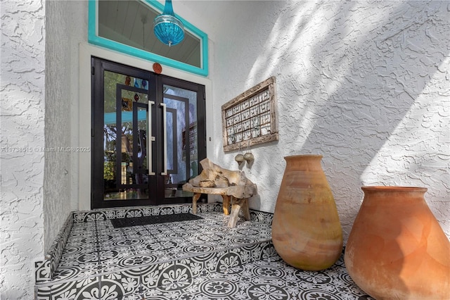 property entrance with french doors