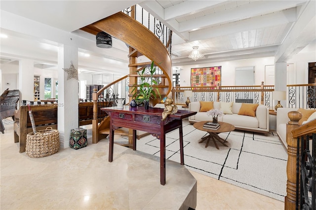 tiled living area featuring stairs and beam ceiling