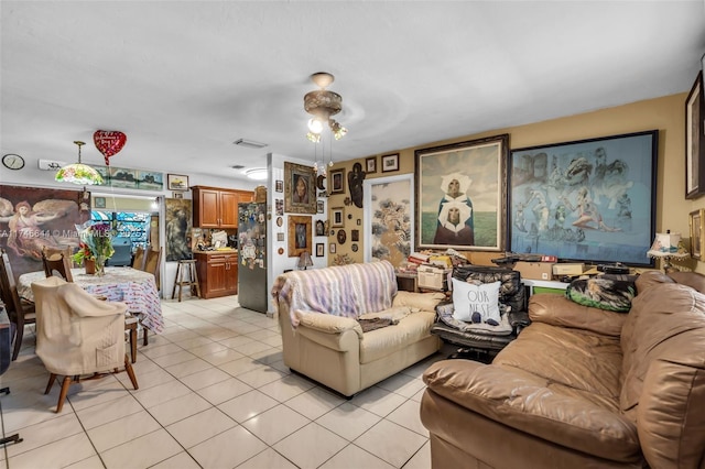 living room featuring light tile patterned flooring