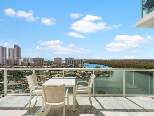 balcony featuring a water view