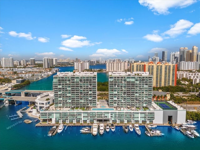 birds eye view of property with a water view