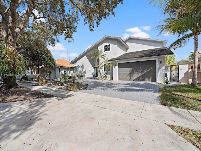 view of front of property with a garage