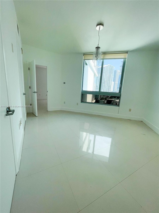 unfurnished bedroom featuring light tile patterned floors
