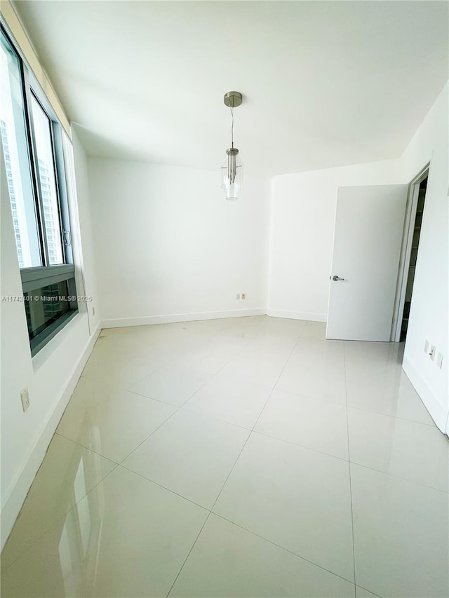 view of tiled spare room