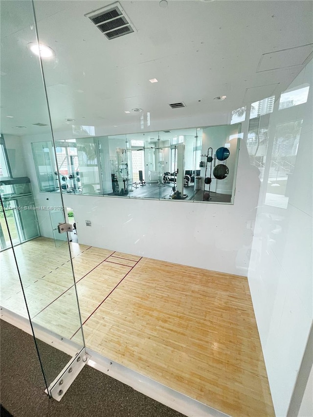exercise room featuring plenty of natural light