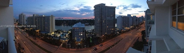 property's view of city featuring a water view