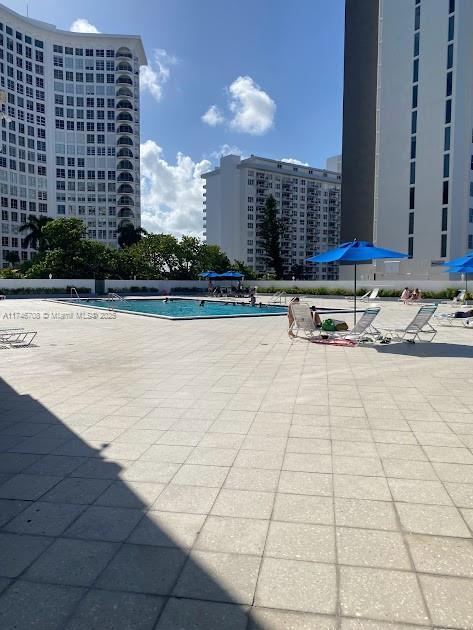 view of pool featuring a patio area