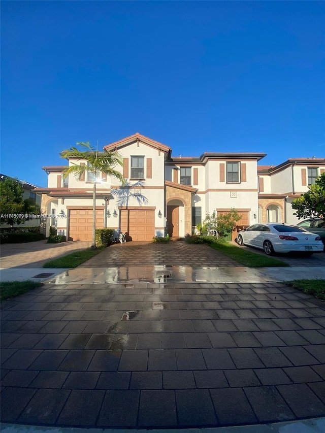 view of front of home with a garage