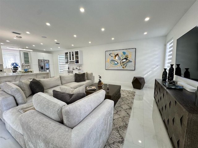 living room with plenty of natural light