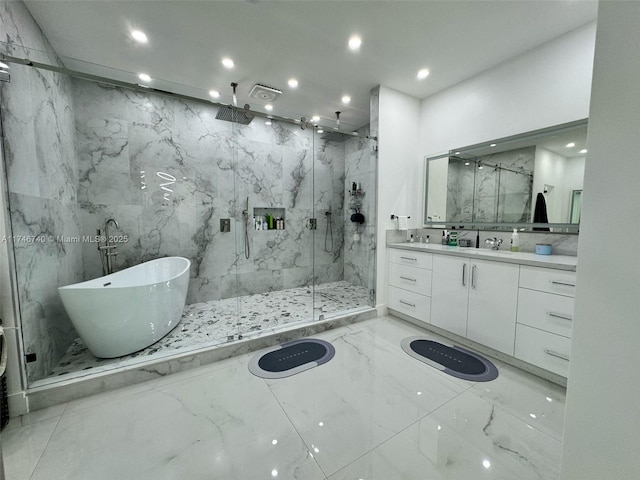 bathroom featuring vanity and plus walk in shower