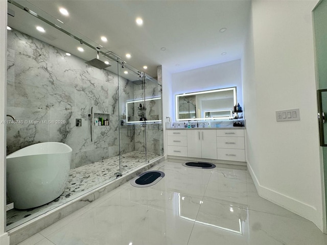 bathroom featuring vanity and plus walk in shower