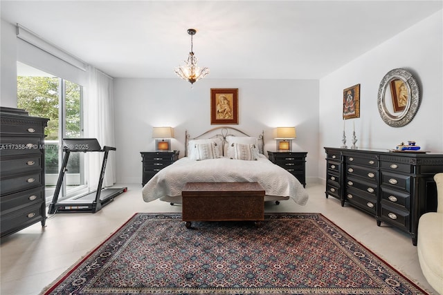 bedroom featuring a chandelier