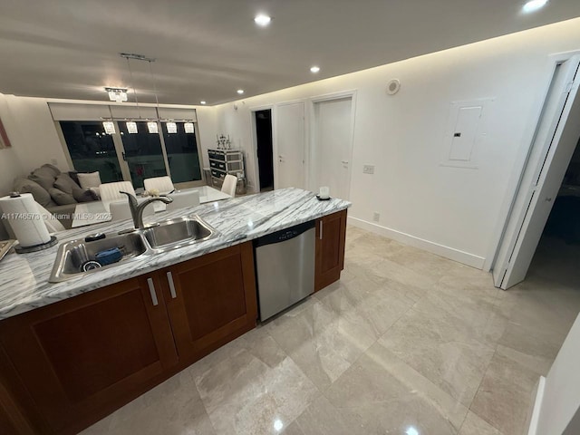 kitchen featuring sink, light stone counters, decorative light fixtures, electric panel, and dishwasher